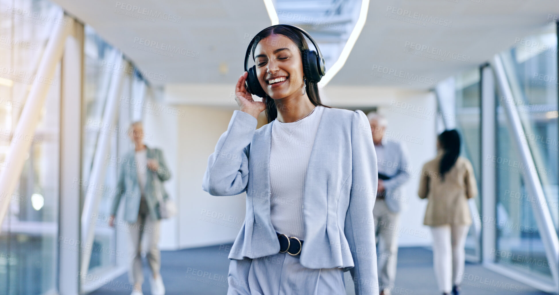 Buy stock photo Business, airport and woman with headphones, walking and happiness with streaming music, radio and audio. Happy person, employee and corporate professional with a headset, sound and consultant