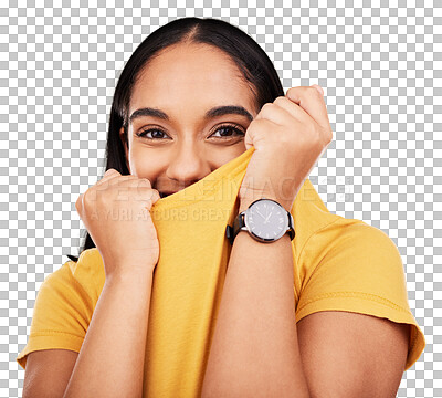 Portrait, shy and funny with a woman on a yellow background in studio pulling on her t-shirt. Face, fashion or playful and an attractive young female covering her mouth with trendy clothes for style