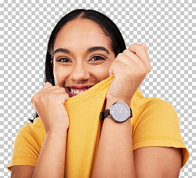 Portrait, shy and playful with a woman on a yellow background in studio pulling on her t-shirt. Face, fashion or funny and an attractive young female covering her mouth with trendy clothes for style