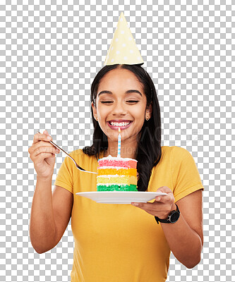 Woman is eating cake, birthday celebration and happy in portrait, rainbow dessert and candle on yellow background. Celebrate, festive and young female, excited for sweet treat and party hat in studio