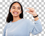 Hand gesture, pinch and measure with a woman on a yellow background in studio to show a size. Smile, review and icon or symbol with an attractive young female posing on a color wall for growth