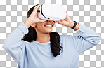 Woman with VR goggles, smile and experience in metaverse, digital world and futuristic on yellow studio background. Virtual reality, technology and UX, happiness and cyber space with gaming