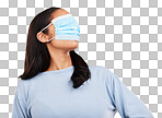 Covid, face mask and blindfold with woman in studio for medical,  crazy and healthcare. Comic, virus and carefree with female on yellow background for vaccine, protection and pandemic safety