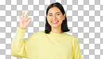 Ok, green screen and portrait of woman doing a perfect sign or hand gesture isolated in a studio background. Excited, happy and female showing approval, accept and agreement signal for perfection