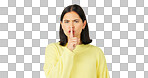 Secret, green screen and face of serious woman in studio, finger and lips on background for privacy. Portrait, angry female model and silence of noise, shush on mouth and quiet for confidential emoji