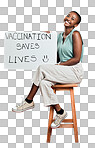 African american covid vaccinated woman showing and holding poster. Portrait of smiling black woman isolated against red studio background with copyspace. Model promoting corona vaccine with sign