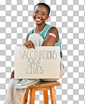 African american covid vaccinated woman showing plaster on arm, holding poster. Portrait of smiling black woman isolated against yellow studio background with copyspace. Promote corona vaccine on sign