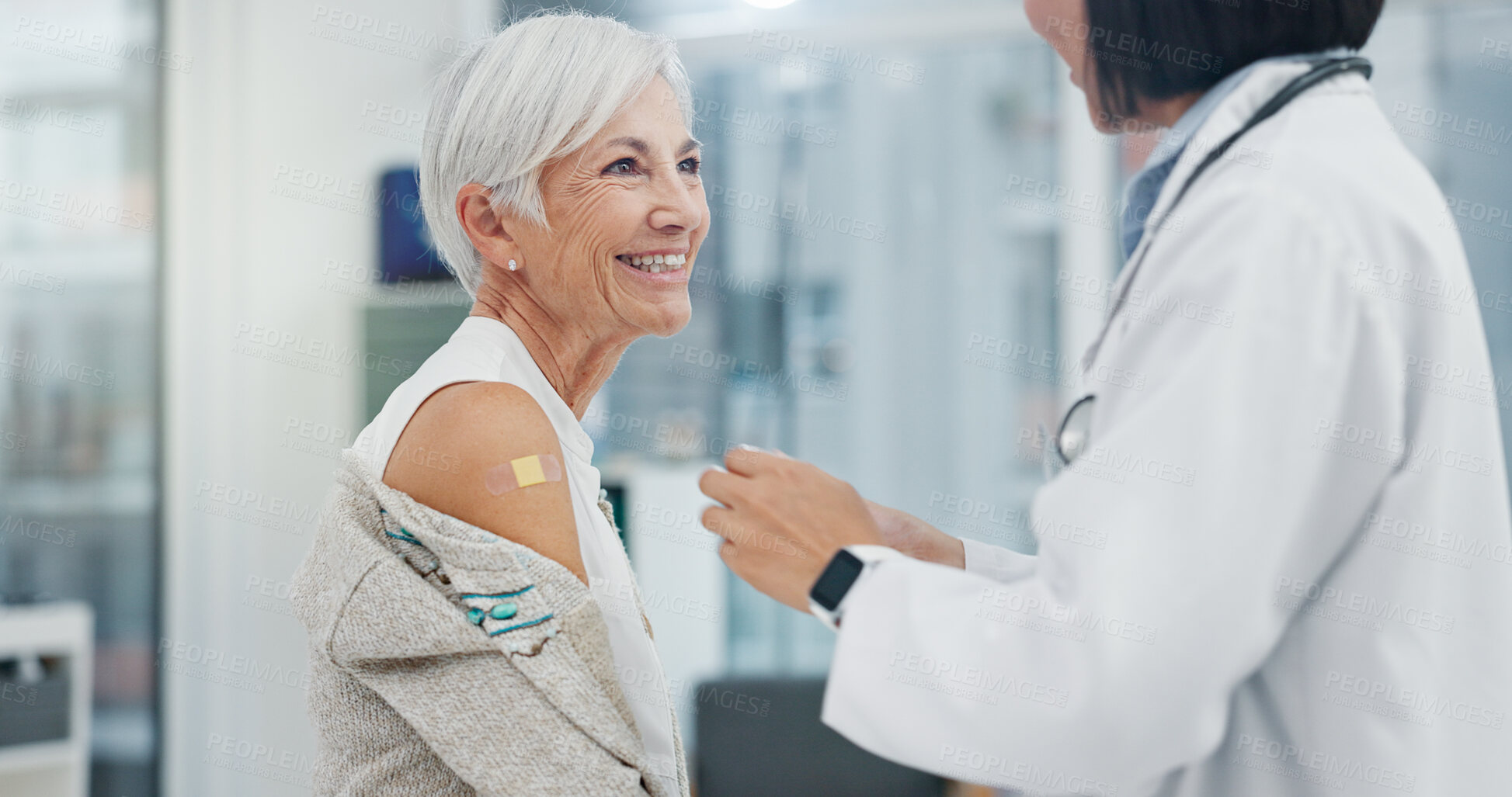 Buy stock photo Vaccine, doctor or plaster on senior patient in hospital for healthcare or medicine treatment. Safety, arm or surgeon nurse with medical aid kit, happy woman or elderly lady in clinic for wellness