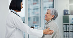 Senior support, talking and woman with a doctor for healthcare advice, consultation and results. Smile, hospital and an elderly patient with a clinic worker and care for a surgery discussion