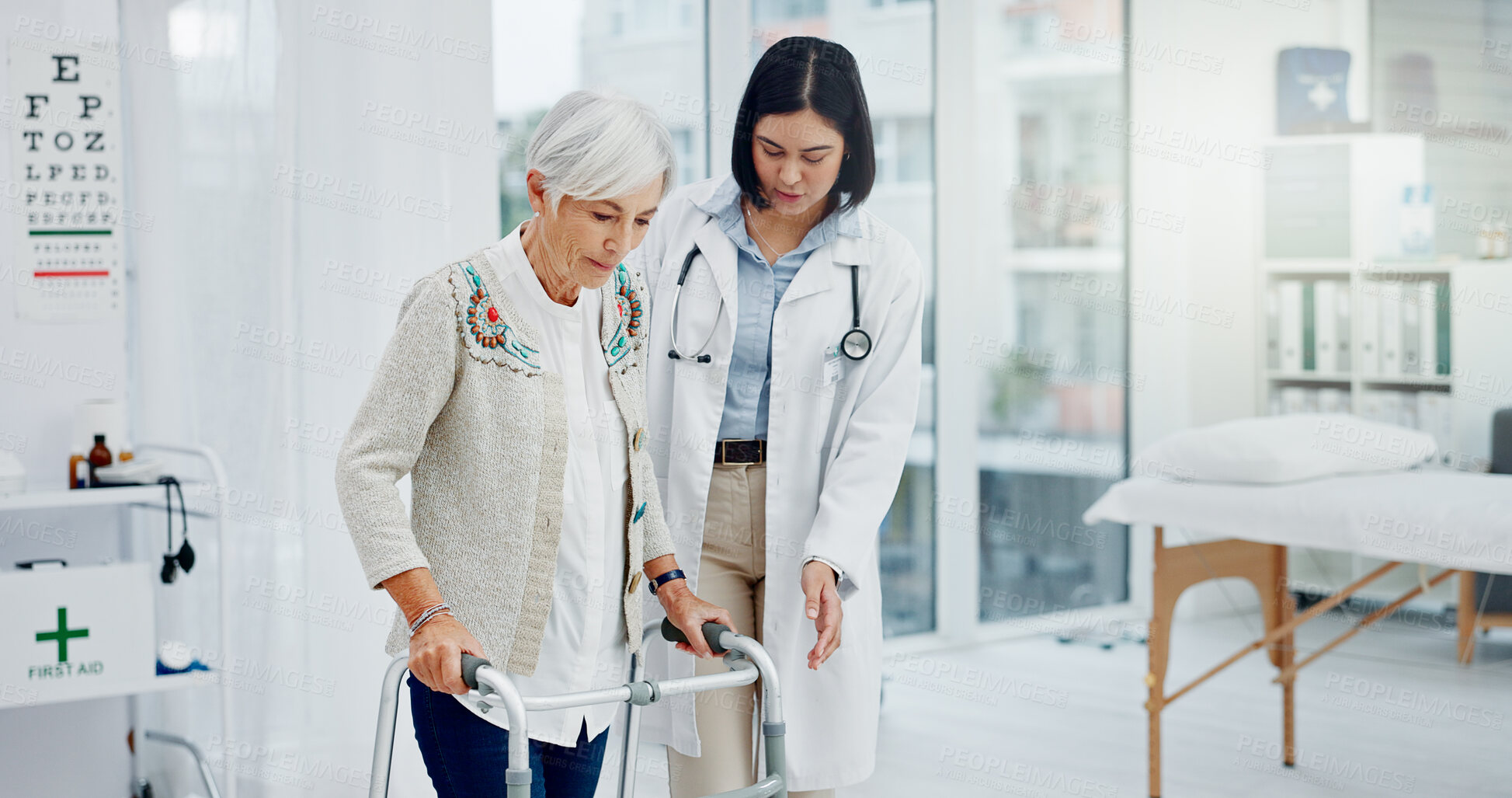 Buy stock photo Doctor, senior woman and walking frame for healthcare service, physiotherapy support and clinic progress. Medical worker helping, consulting and physical therapy of an elderly patient with disability