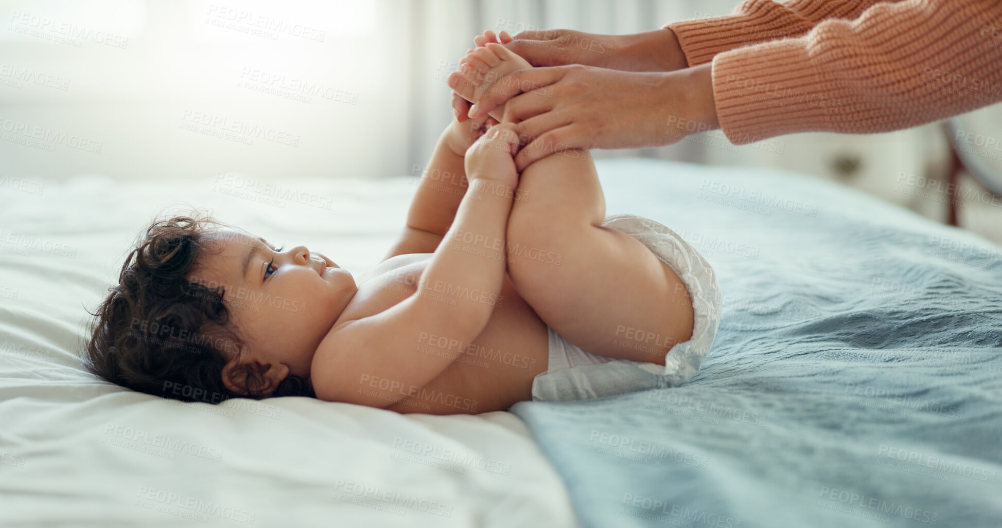 Buy stock photo Hands, love and a baby in a bedroom with a parent in the home together for trust, care or bonding closeup. Family, kids or security with an adult and infant child on the bed in a house for growth