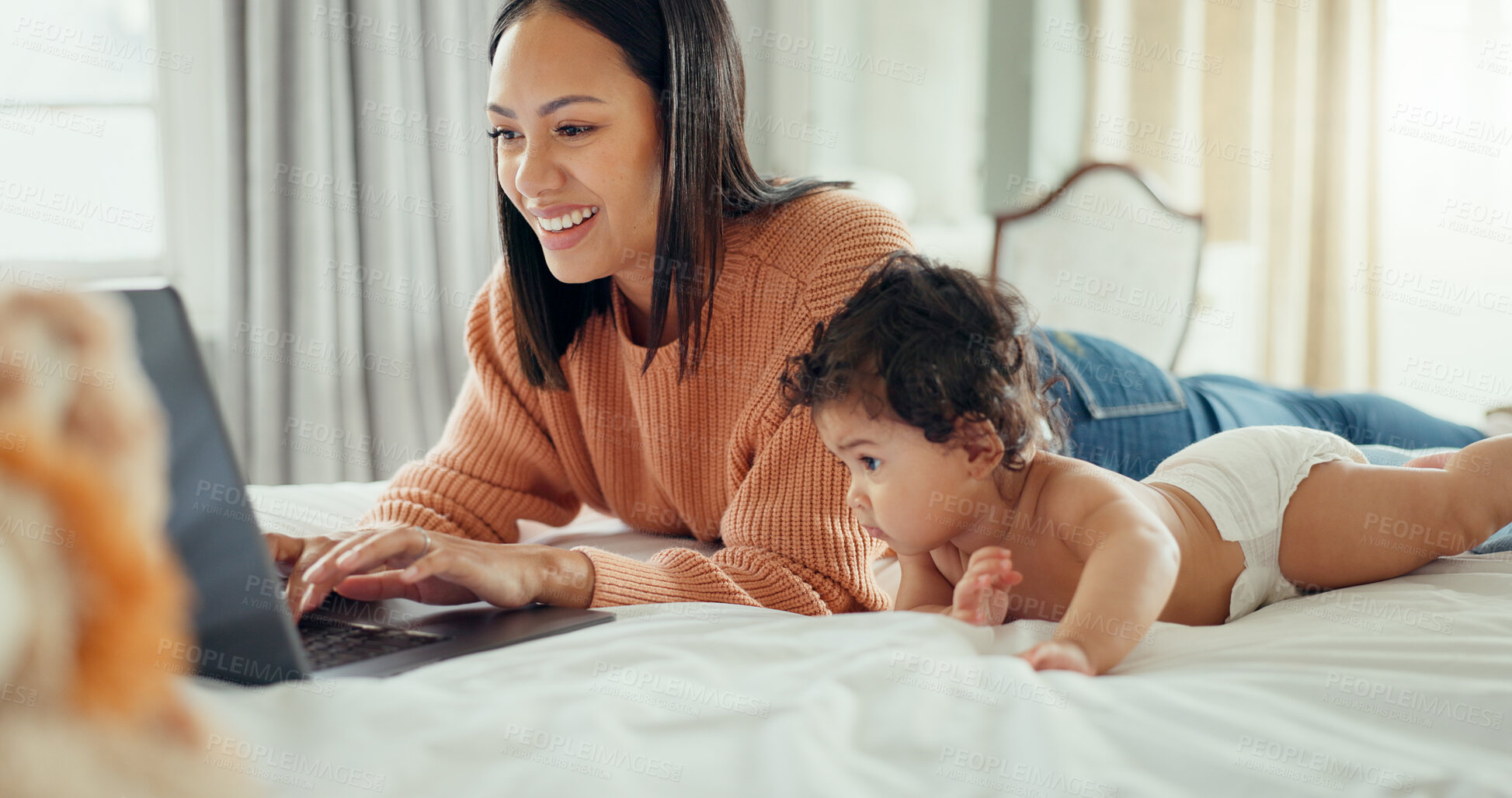 Buy stock photo Bed, laptop and mother typing with baby doing remote work, playing and babysitting in a home bedroom. Happy, online and mom typing with newborn or infant while writing a blog on website or internet