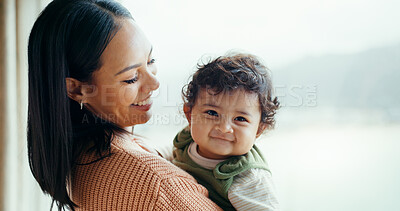Buy stock photo Home, mother and baby with a smile, window and care with comfort, happiness and bonding with woman. Portrait, happy mama and child with parent, kid and infant with wellness, trust and health mockup