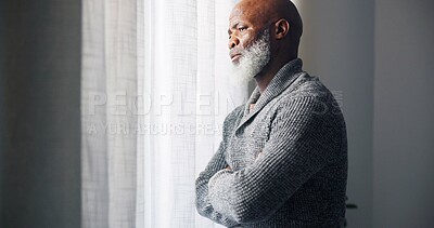 Depressed, sad and senior man in home with mourning and memory with mental health problem. Elderly male person, sorry and anxiety in a house feeling disappointed in retirement with grief and fail