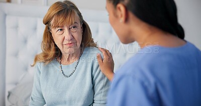 Comfort, conversation and nurse with a senior woman after a cancer diagnosis in retirement home. Healthcare, consultation and elderly female patient listening to doctor at medical checkup in bedroom.