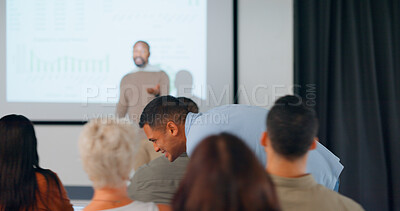 Conference, seminar and man late in audience for training workshop, finance talk and presentation. Business people with speaker or coach for knowledge, budget or growth analysis meeting on screen