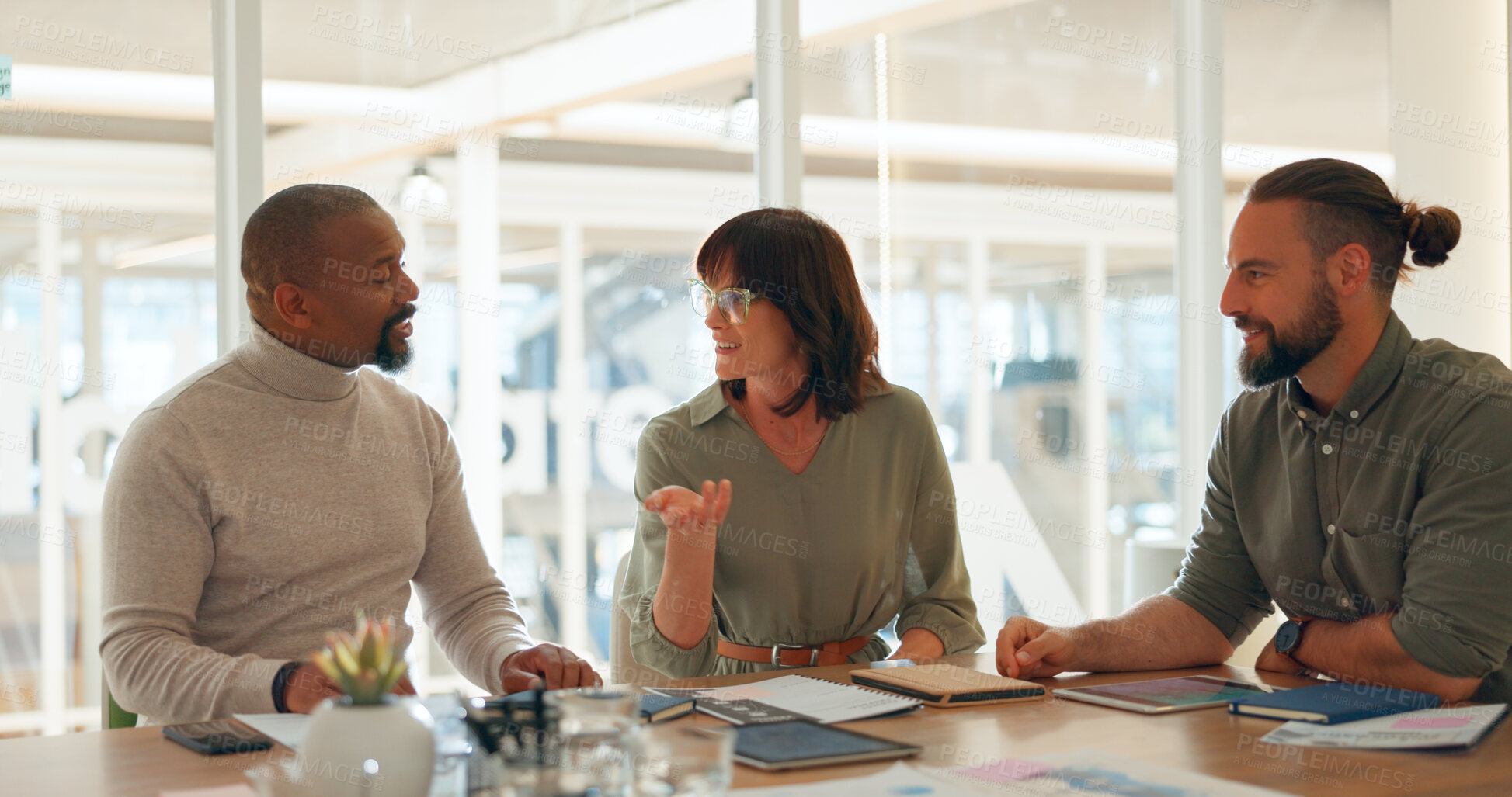 Buy stock photo Meeting, conversation and business people in the office for working on a creative project in collaboration. Teamwork, diversity and group of designers in discussion for planning in modern workplace.