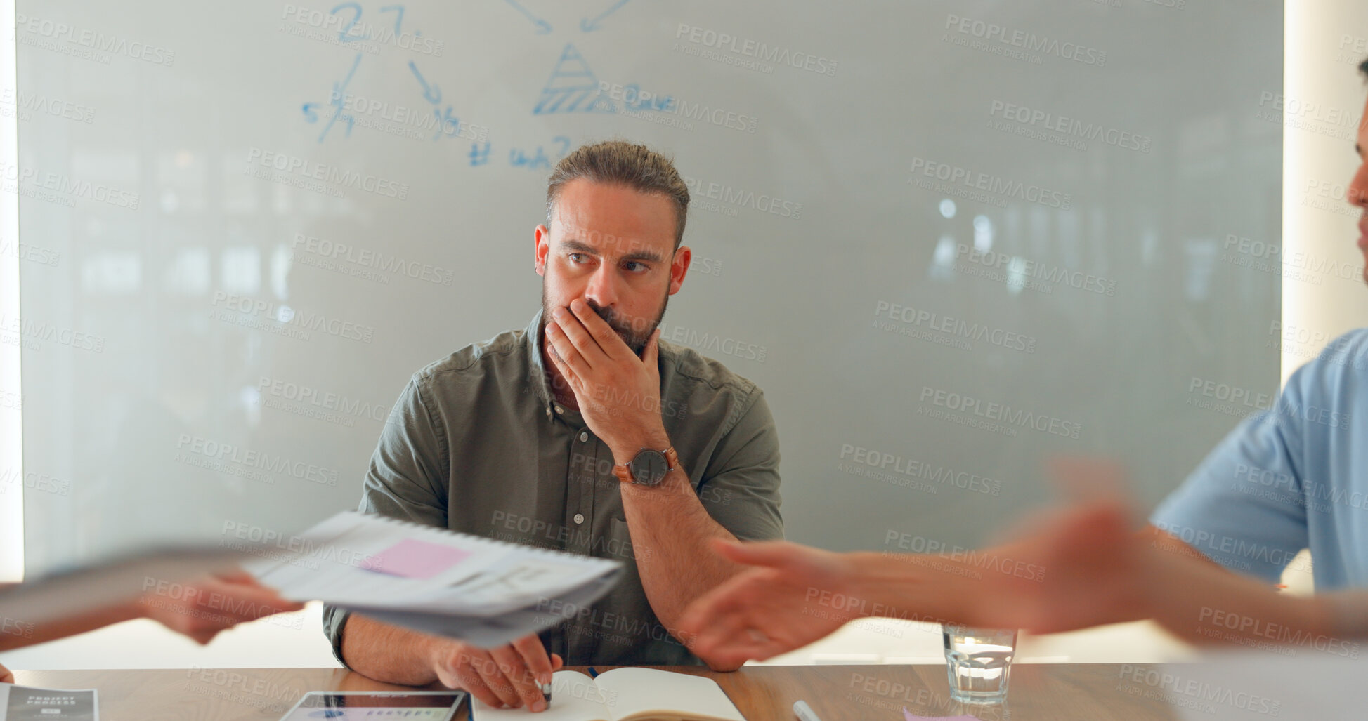 Buy stock photo Man, thinking and meeting at work or stress for team documents, tired or management. Male person, board room and table or employee strategy for collaboration papers, office fatigue or problem solving