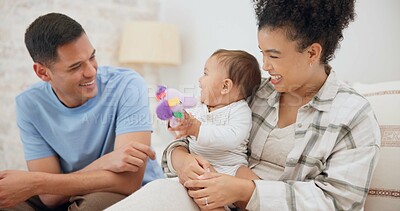 Couple, family and quality time with baby, mom and dad playing with toys for fun, laughing together in home, bedroom or nursery. Newborn, infant and happiness in motherhood, family or child smile