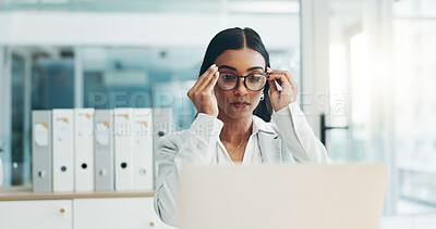 Buy stock photo Business woman, glasses adjustment and laptop in office for planning, reading email and internet research in law firm. Serious Indian lawyer, eyewear and computer for working on legal project online