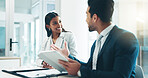 Tablet, meeting and partnership with business people working in an office as a team for research. Technology, planning or teamwork with a man and woman employee reading information in the workplace