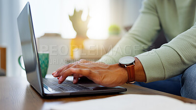 Closeup, work from home and hands with a laptop, typing and connection with network, smartphone and keyboard. Person, entrepreneur or freelancer with pc, deadline and search internet for website info