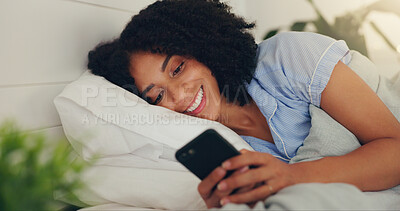 Phone text, happy woman and bed of a young female texting on a social media app in the morning. Wifi, web networking and happiness of a young person with a smile in a house reading a message