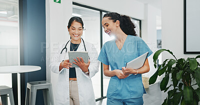 Talking doctor, walking or nurse on tablet in busy hospital teamwork, women collaboration or bonding with surgery joke. Smile, happy or laughing healthcare workers on medical technology meme or comic
