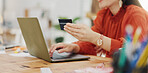 Woman hands, credit card and laptop for business online shopping, trading or fintech payment in office startup. Professional person typing bank information on computer for website loan or transaction