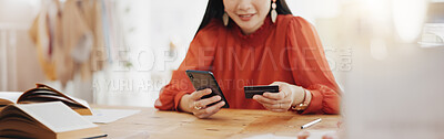 Woman hands, credit card and phone for business online shopping, trading or fintech payment in office startup. Professional person typing bank information on cellphone for website loan or transaction