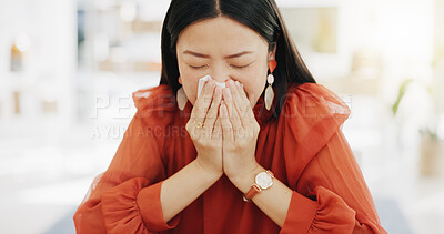 Tissue, blowing nose and sick Asian woman in office with sinus infection, virus and allergy symptoms. Business, corporate workplace and female worker at desk with cold, fever problem and flu sickness