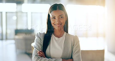 Portrait, happy business woman and arms crossed for legal advice in office with confidence, pride and trust. Manager, professional female lawyer at law firm or young attorney with smile at workplace.