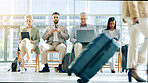 Technology, airport and waiting room row of business people check plane schedule, travel flight booking or transport journey. Airplane departure, lobby and group work on tablet, cellphone or phone