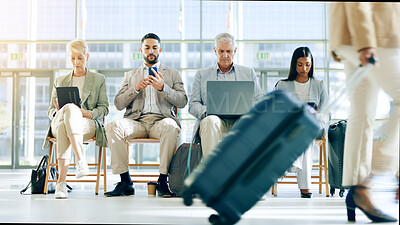 Technology, airport and waiting room row of business people check plane schedule, travel flight booking or transport journey. Airplane departure, lobby and group work on tablet, cellphone or phone
