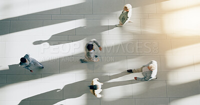 Business people, crowd walking and top view in office with employee and worker travel. Movement, staff and person steps of company, professional and workforce from above in a corporate workplace