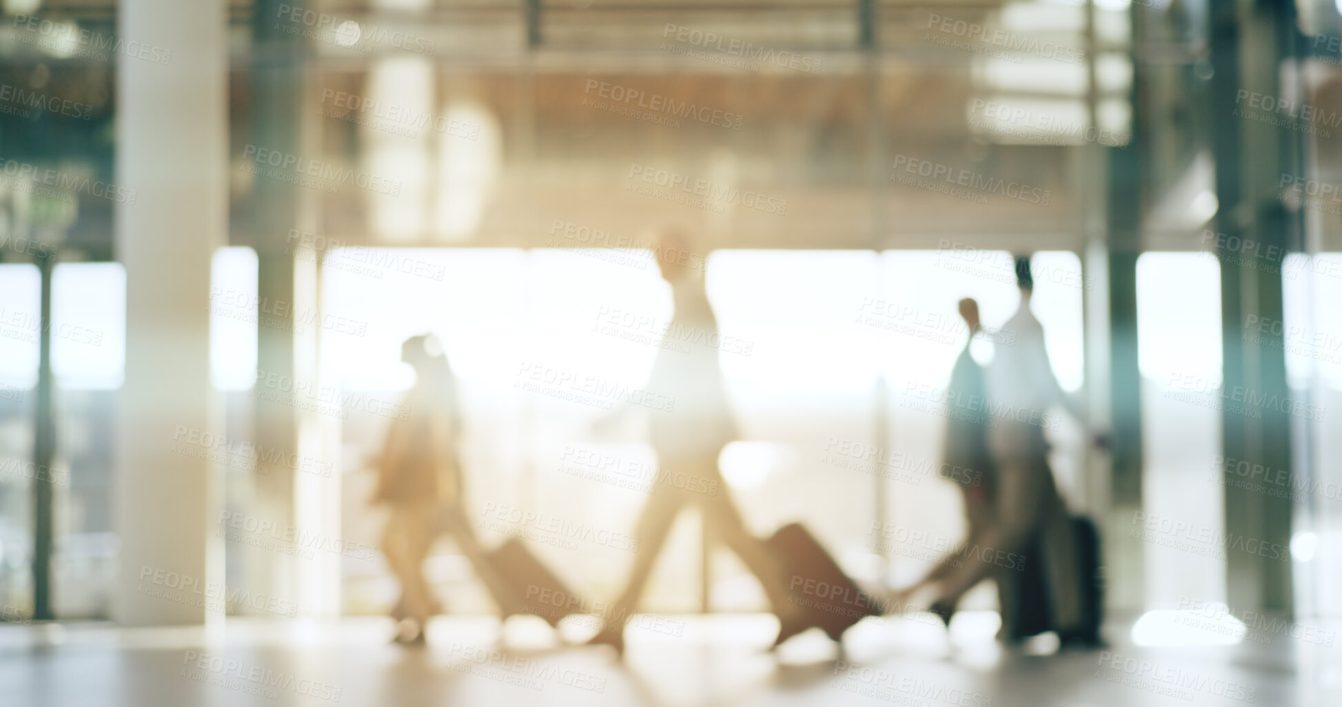 Buy stock photo Blurred background, travel and business people in an airport with suitcase for departure on an international flight. Flare, luggage and an employee group walking in a terminal or lobby for boarding