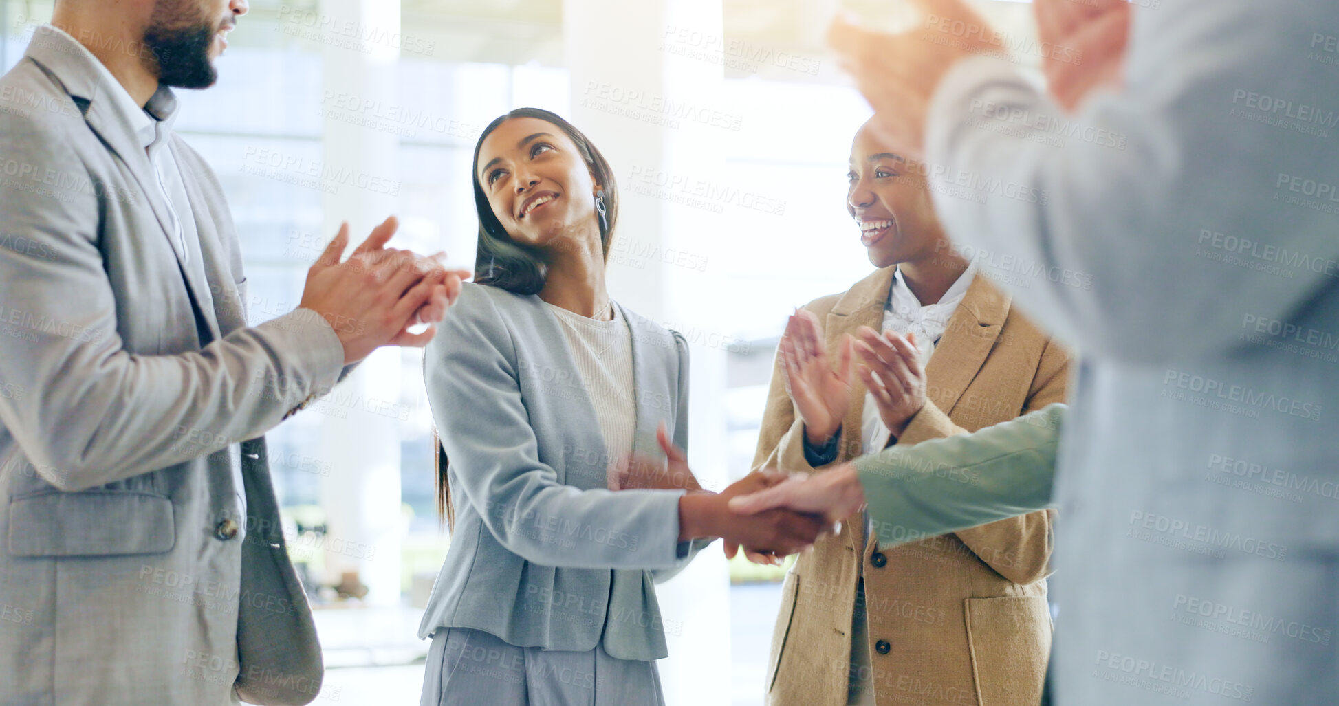 Buy stock photo Business people, handshake and applause in teamwork for hiring, promotion or b2b deal at office. Happy woman shaking hands with group clapping in team recruiting, meeting or agreement at workplace