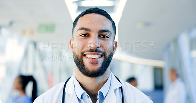 Man, face and doctor smile in hospital for healthcare services, surgery and consulting in Saudi Arabia. Portrait of happy surgeon, therapist and medical professional working with trust in busy clinic