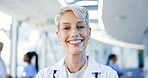 Woman, face and doctor smile in hospital for healthcare services, surgery or consulting in Australia. Portrait of happy surgeon, senior manager and medical therapist working with trust in busy clinic