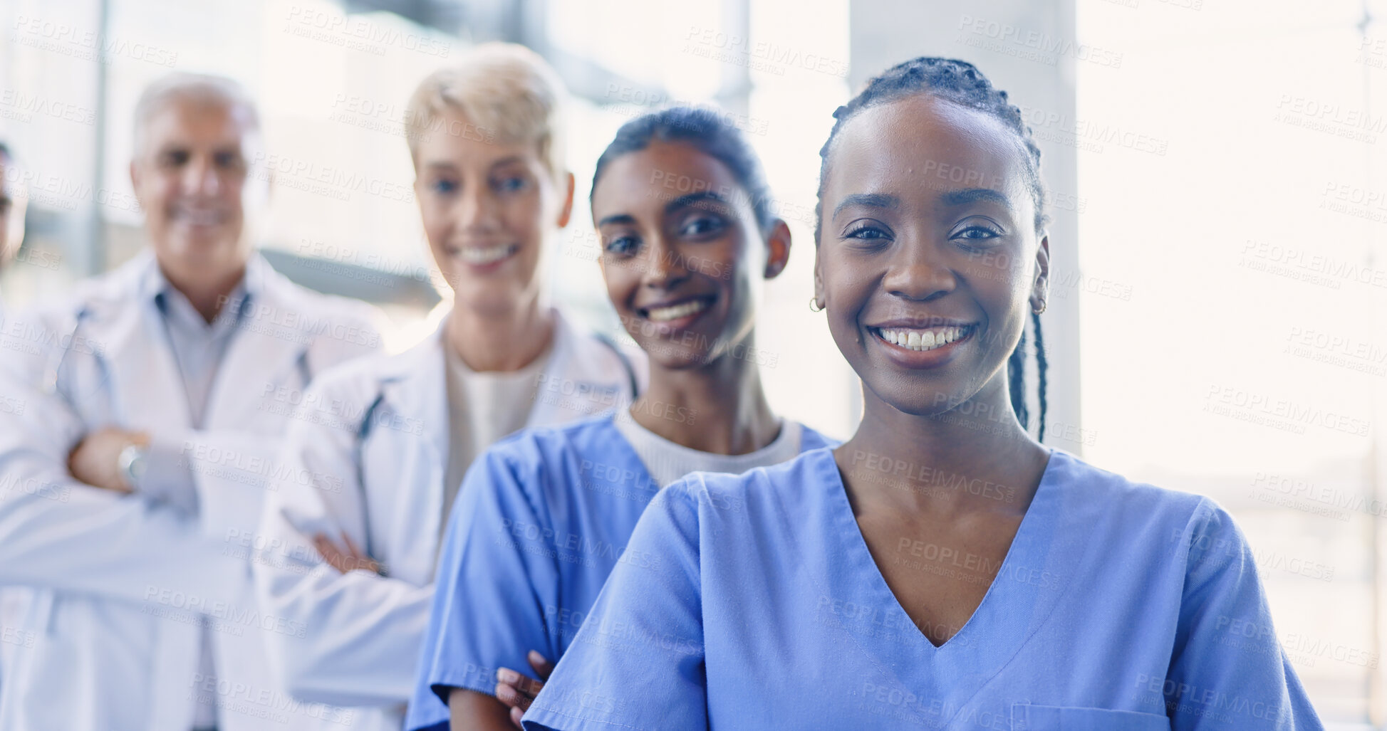 Buy stock photo Happy, crossed arms and portrait of team of doctors in the hospital for medical diagnosis or treatment. Smile, diversity and healthcare workers in collaboration with confidence in a medicare clinic.