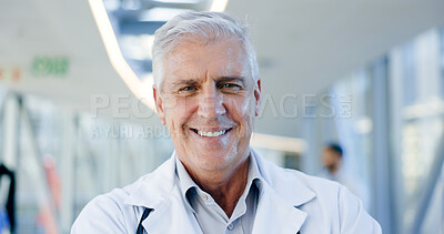 Doctor pride, face and a man with arms crossed for healthcare, emergency service or nursing. Happy, hospital and portrait of a mature surgeon or clinic worker with confidence in medical career
