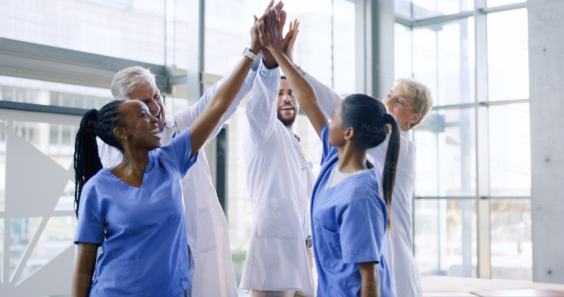 Buy stock photo High five, group of nurses and doctors in healthcare with success, support and celebration for medical win at hospital. Men, women and health, diversity and teamwork, hands together for achievement