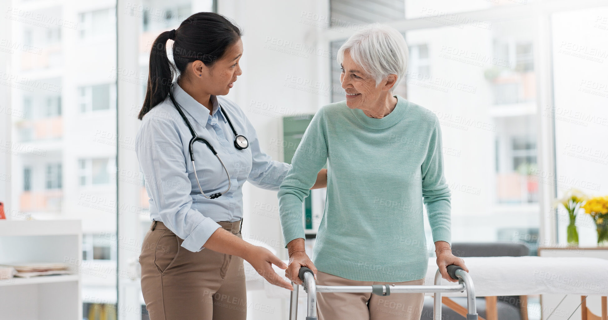 Buy stock photo Rehabilitation, walker or doctor walking with old woman in retirement or hospital for wellness or support. Physio, nurse helping or elderly patient learning with frame in physical therapy recovery