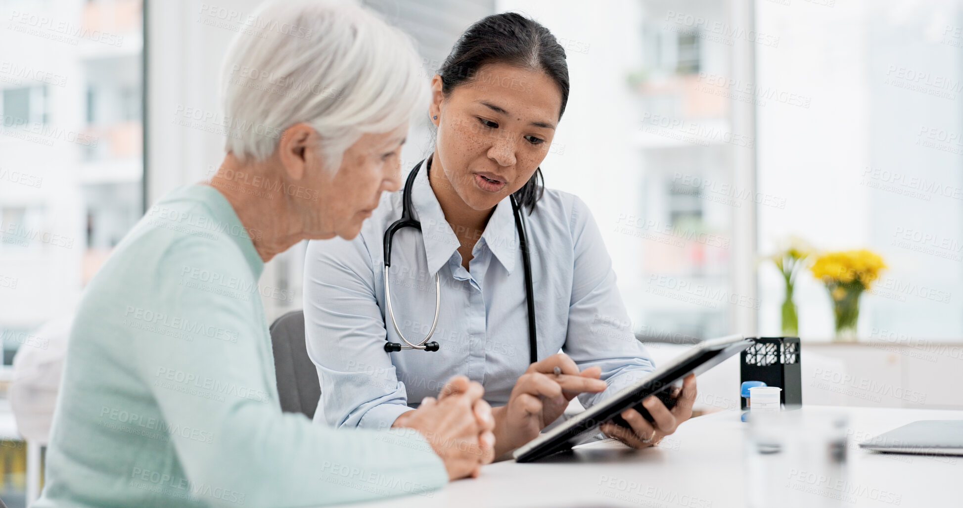 Buy stock photo Results, tablet and senior woman with doctor talking about healthcare data, report or communication in elderly care or consultation. Patient, nurse and advice in meeting with medical worker or expert