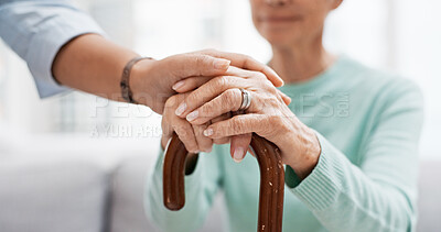 Senior woman, walking cane and holding hands of nurse with healthcare support for retirement. Caregiver, elderly female person and empathy with care and nursing of patient with help in a home