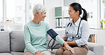 Doctor, senior patient and blood pressure check with consultation, talking and help, health in hospital office. Women at clinic, communication and cardiovascular healthcare, elderly care and support