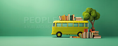 Yellow school bus, tree and books on green copyspace background