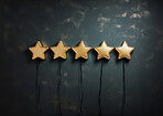 Five gold star rating on dark background. Feedback, review, and rate us concept