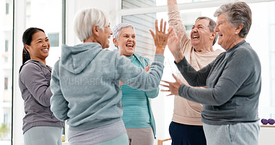 Fitness, hands together and senior people for exercise support, celebration and teamwork in workout class. Exercise, training goal and group of elderly man and women with high five for health success