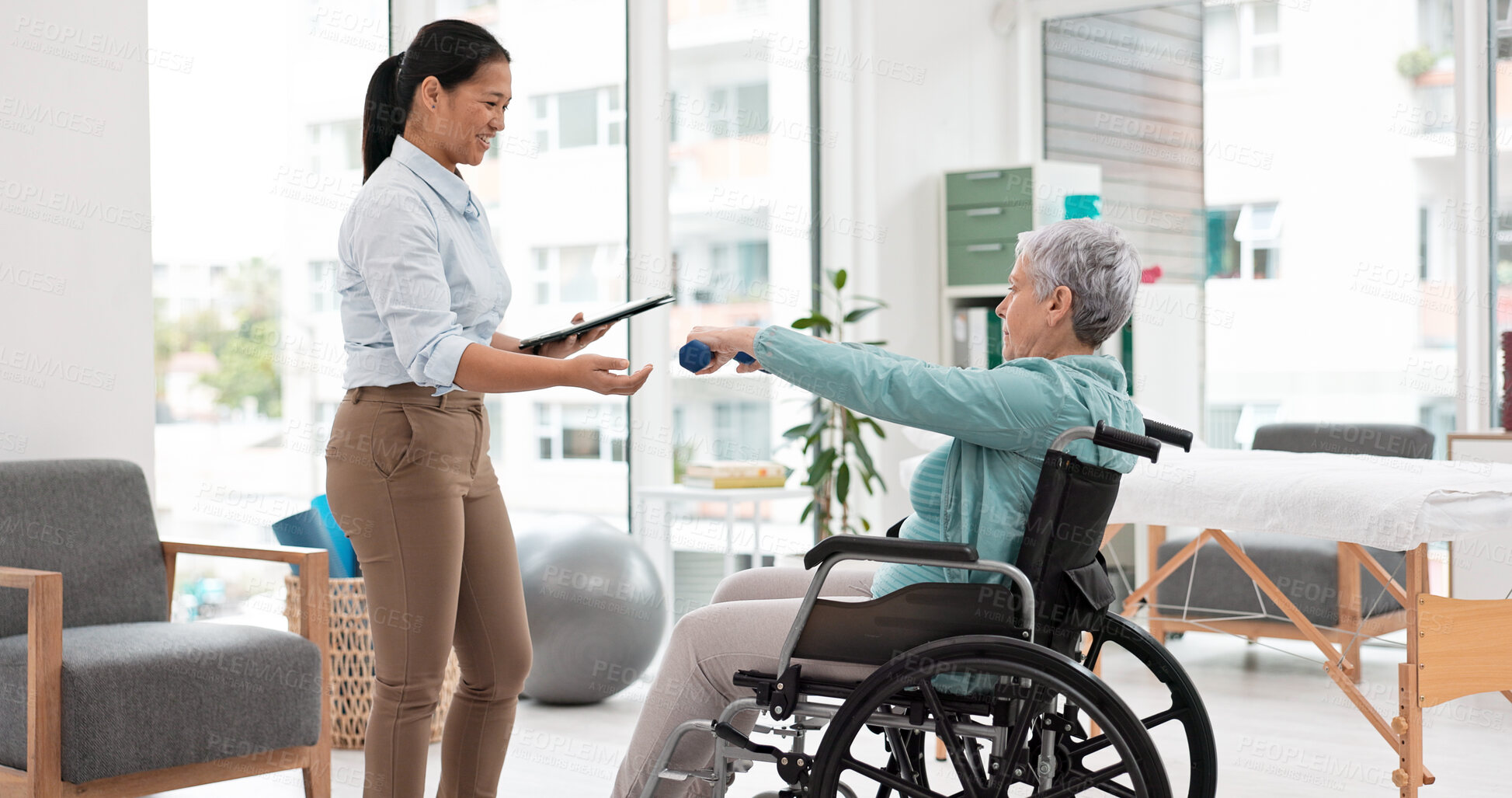 Buy stock photo Woman with disability, physiotherapy and dumbbell exercise for healthcare assessment, test or digital checklist of medical progress. Physiotherapist, tablet or consulting senior patient in wheelchair